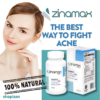 Zinamax: Natural Acne Solution for Clear Skin | Shopizan A smiling woman with clear skin holds Zinamax acne supplement bottle and box. Text highlights '100% Natural' and 'The Best Way to Fight Acne' by Shopizan.